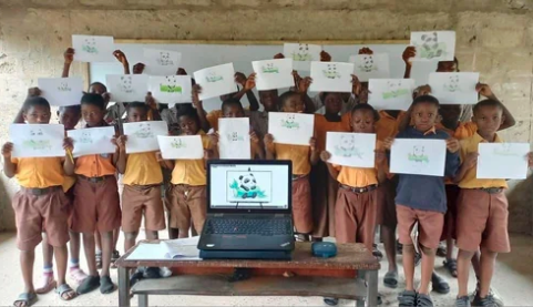 Students holding up their artwork during an online coaching session, Kenya